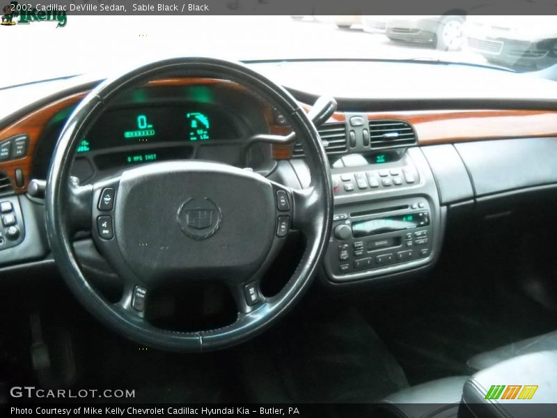 Sable Black / Black 2002 Cadillac DeVille Sedan