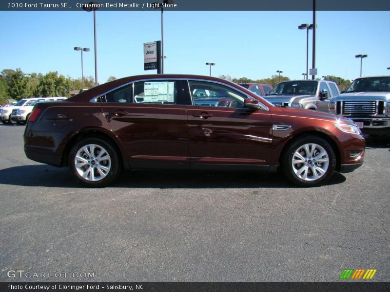 Cinnamon Red Metallic / Light Stone 2010 Ford Taurus SEL