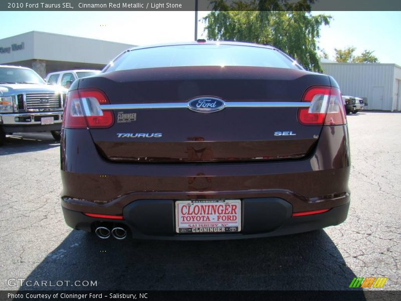 Cinnamon Red Metallic / Light Stone 2010 Ford Taurus SEL
