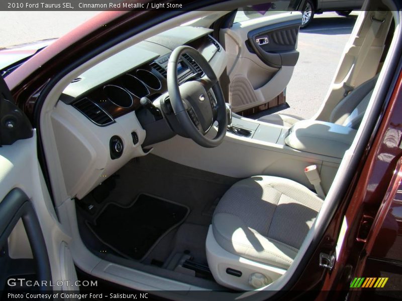 Cinnamon Red Metallic / Light Stone 2010 Ford Taurus SEL