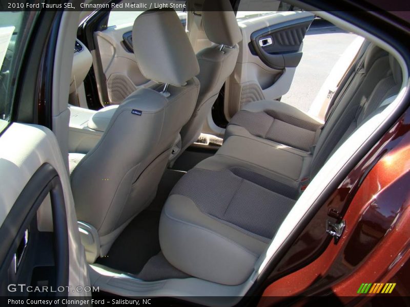 Cinnamon Red Metallic / Light Stone 2010 Ford Taurus SEL