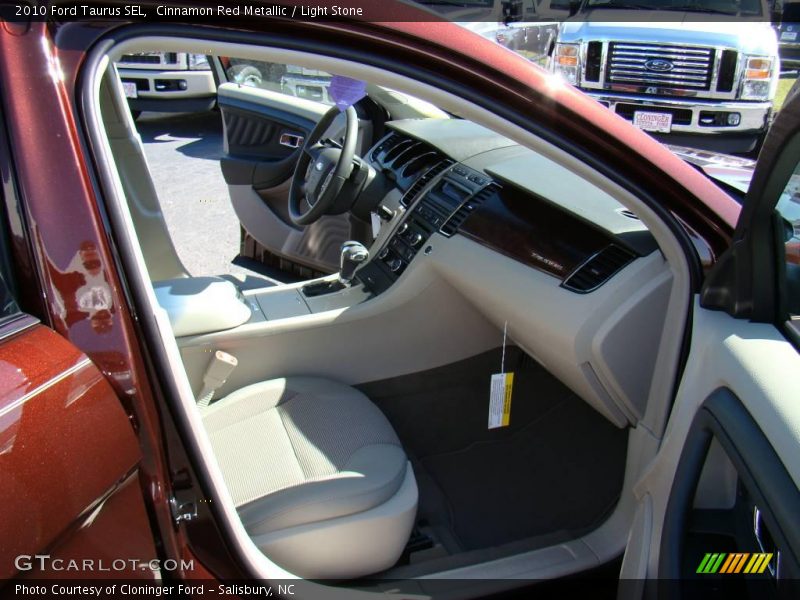 Cinnamon Red Metallic / Light Stone 2010 Ford Taurus SEL