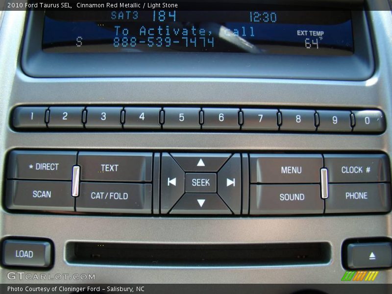 Cinnamon Red Metallic / Light Stone 2010 Ford Taurus SEL