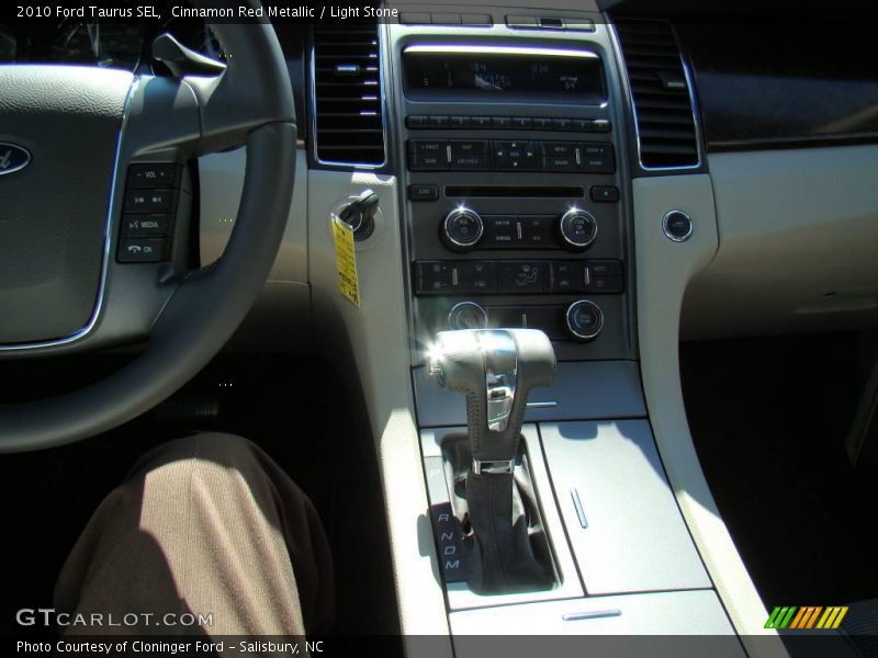 Cinnamon Red Metallic / Light Stone 2010 Ford Taurus SEL
