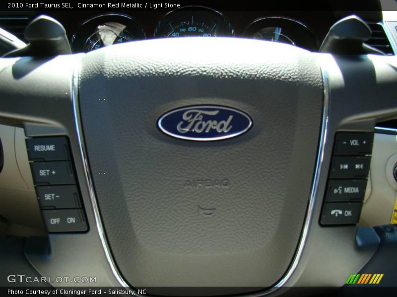 Cinnamon Red Metallic / Light Stone 2010 Ford Taurus SEL