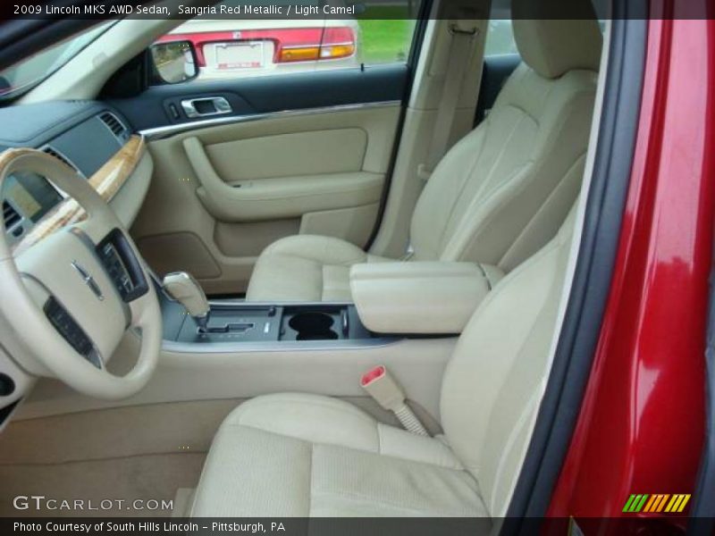 Sangria Red Metallic / Light Camel 2009 Lincoln MKS AWD Sedan