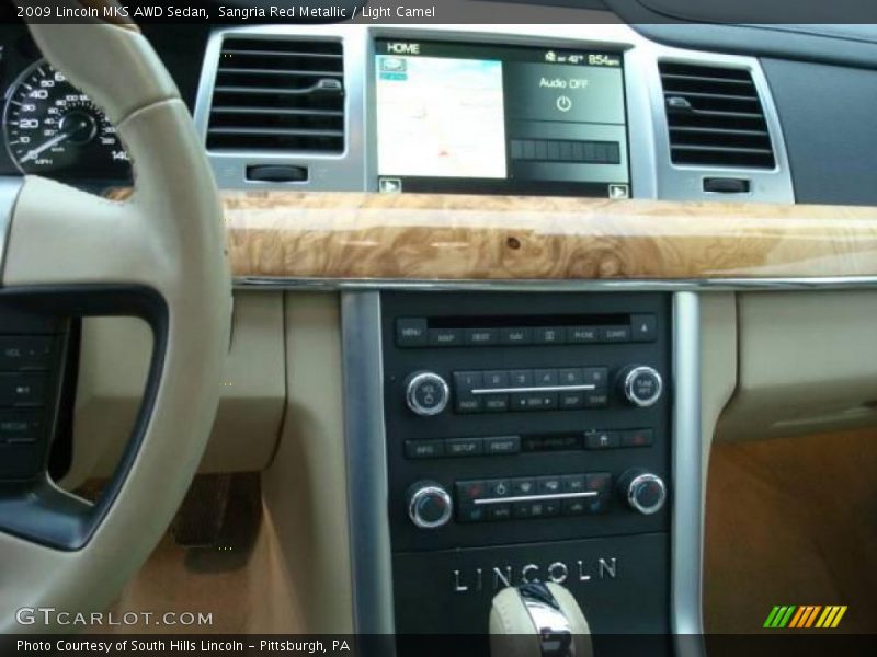 Sangria Red Metallic / Light Camel 2009 Lincoln MKS AWD Sedan
