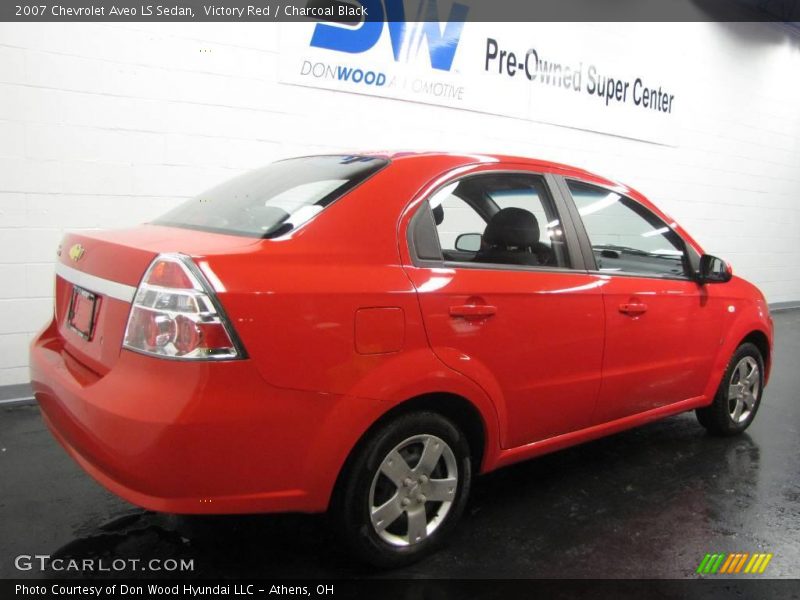 Victory Red / Charcoal Black 2007 Chevrolet Aveo LS Sedan