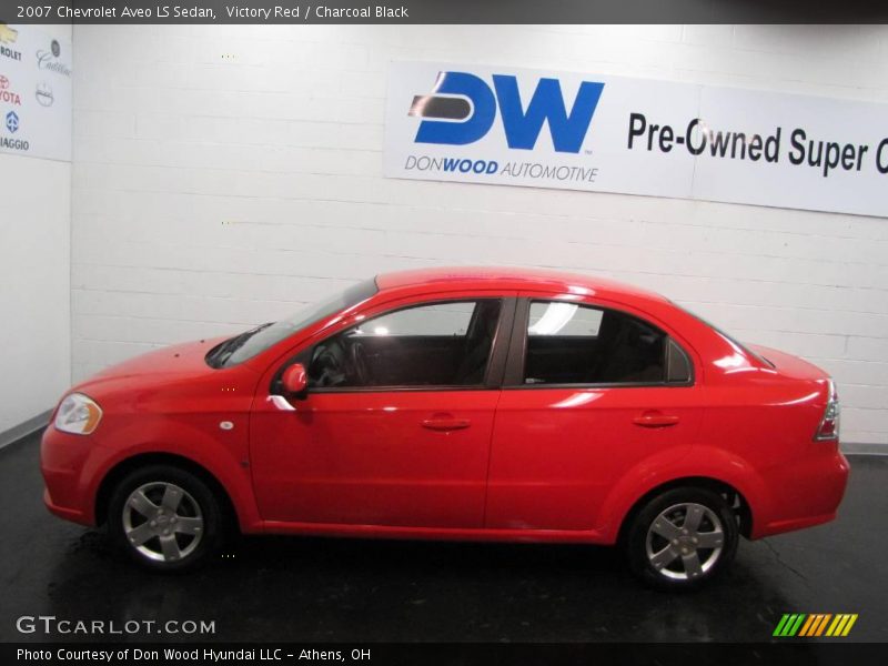 Victory Red / Charcoal Black 2007 Chevrolet Aveo LS Sedan
