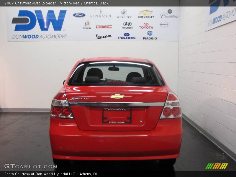 Victory Red / Charcoal Black 2007 Chevrolet Aveo LS Sedan