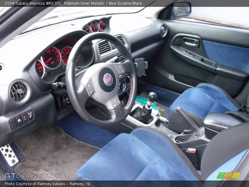 Platinum Silver Metallic / Blue Ecsaine/Black 2004 Subaru Impreza WRX STi