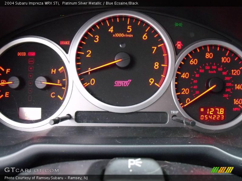Platinum Silver Metallic / Blue Ecsaine/Black 2004 Subaru Impreza WRX STi