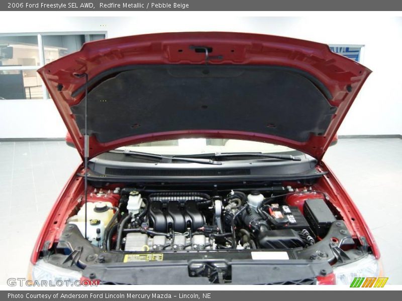 Redfire Metallic / Pebble Beige 2006 Ford Freestyle SEL AWD