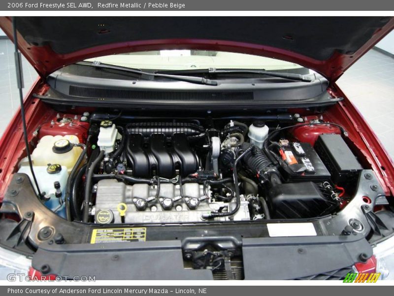 Redfire Metallic / Pebble Beige 2006 Ford Freestyle SEL AWD