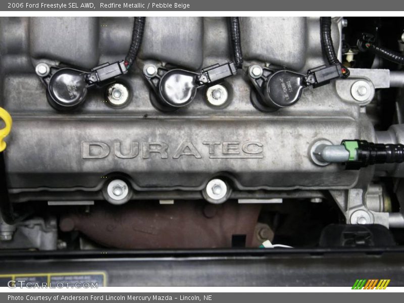 Redfire Metallic / Pebble Beige 2006 Ford Freestyle SEL AWD