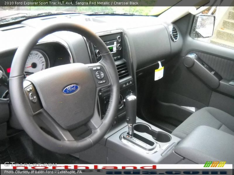 Sangria Red Metallic / Charcoal Black 2010 Ford Explorer Sport Trac XLT 4x4