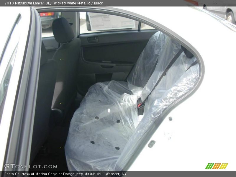 Wicked White Metallic / Black 2010 Mitsubishi Lancer DE
