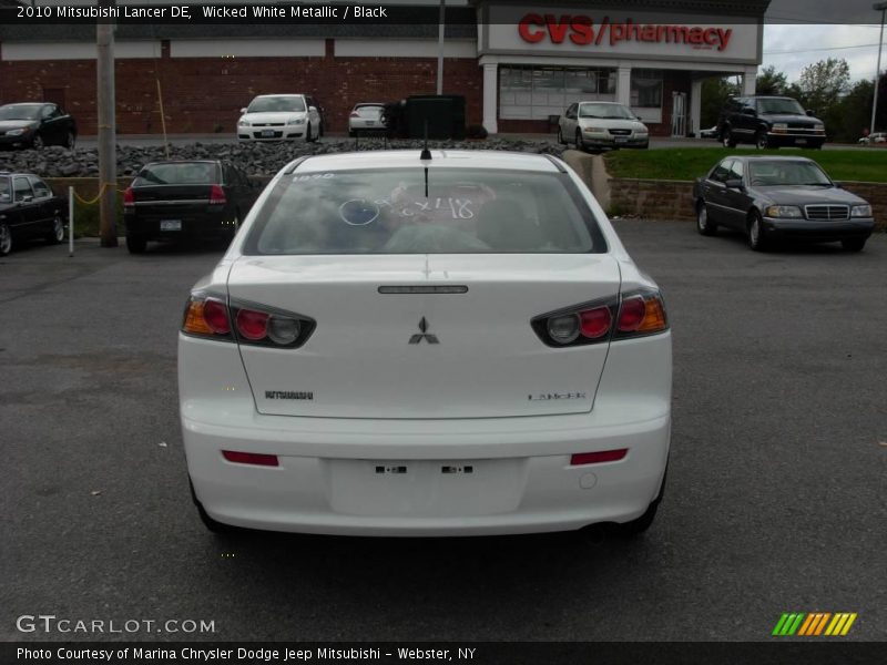 Wicked White Metallic / Black 2010 Mitsubishi Lancer DE
