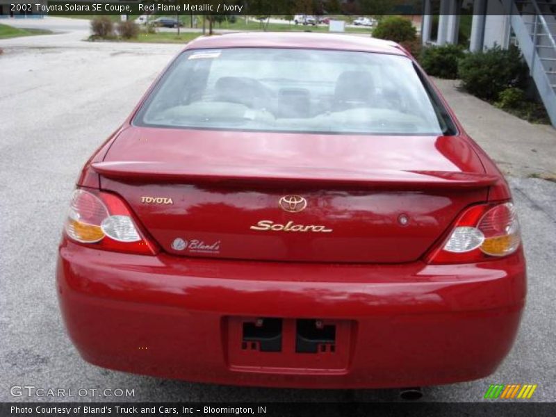 Red Flame Metallic / Ivory 2002 Toyota Solara SE Coupe