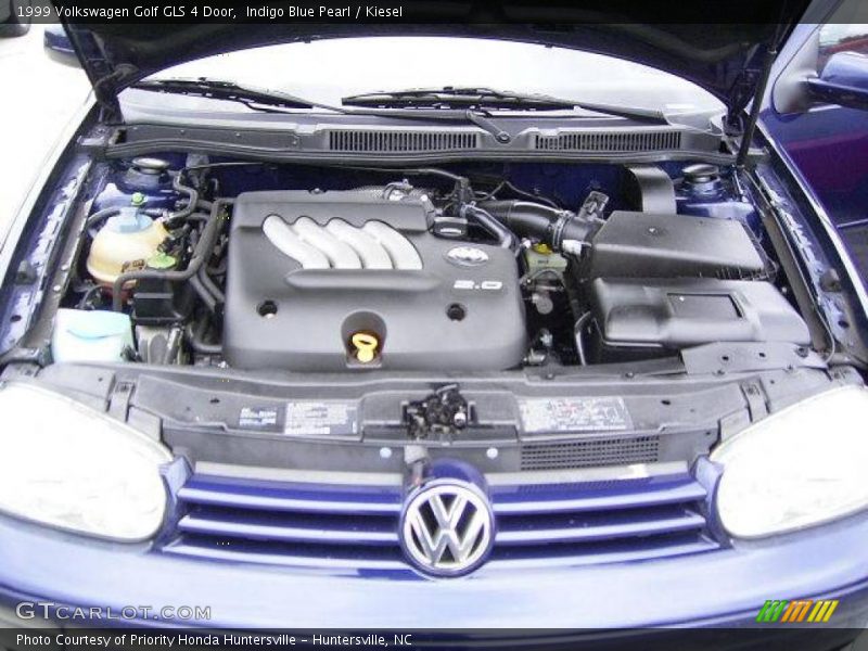 Indigo Blue Pearl / Kiesel 1999 Volkswagen Golf GLS 4 Door