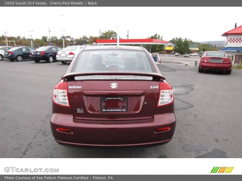 Cherry Red Metallic / Black 2009 Suzuki SX4 Sedan