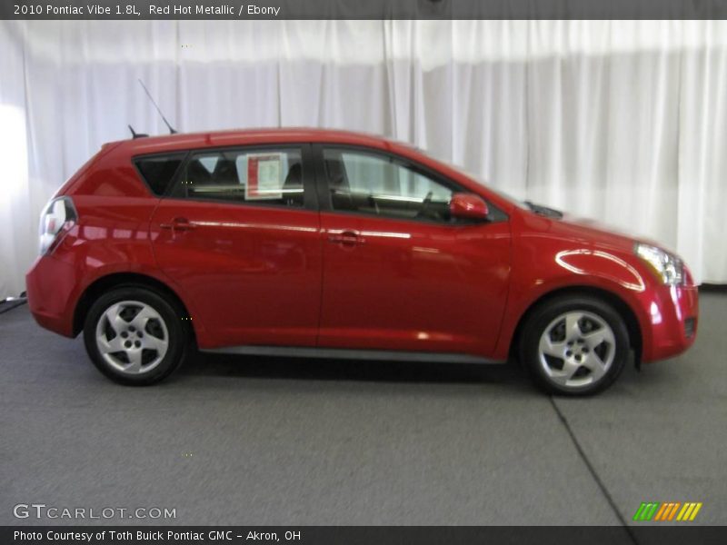 Red Hot Metallic / Ebony 2010 Pontiac Vibe 1.8L