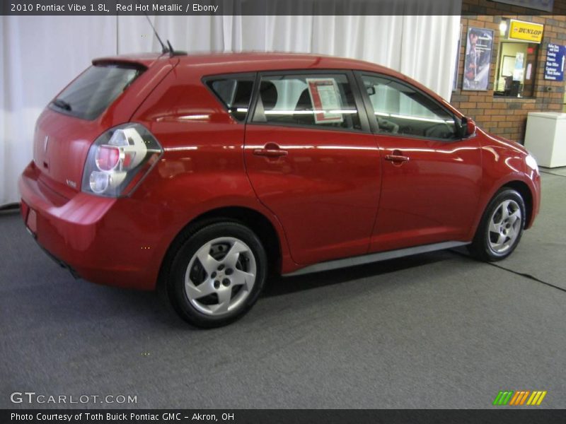 Red Hot Metallic / Ebony 2010 Pontiac Vibe 1.8L