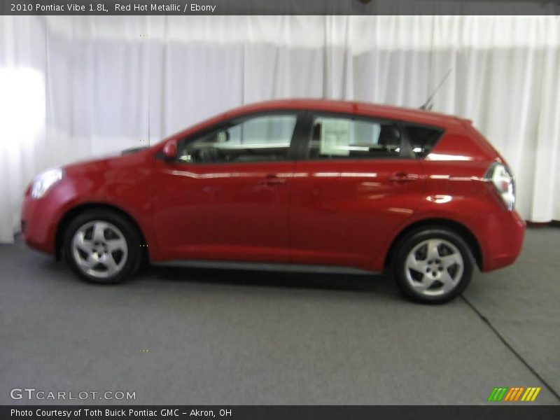 Red Hot Metallic / Ebony 2010 Pontiac Vibe 1.8L