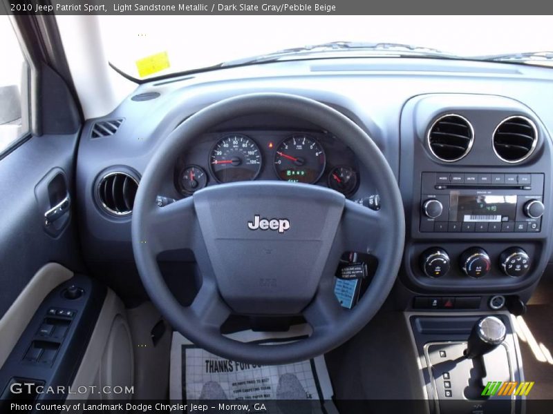 Light Sandstone Metallic / Dark Slate Gray/Pebble Beige 2010 Jeep Patriot Sport