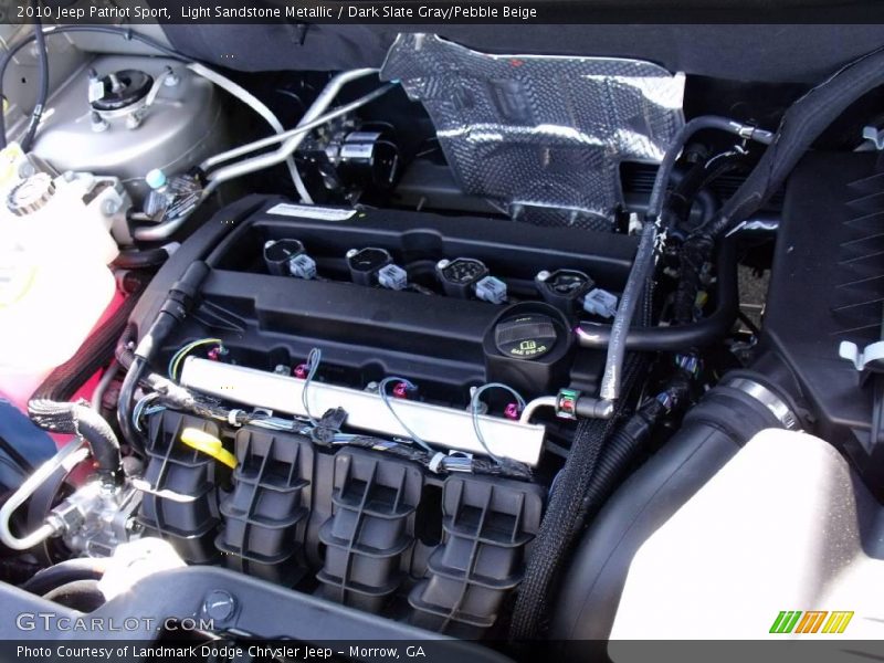 Light Sandstone Metallic / Dark Slate Gray/Pebble Beige 2010 Jeep Patriot Sport