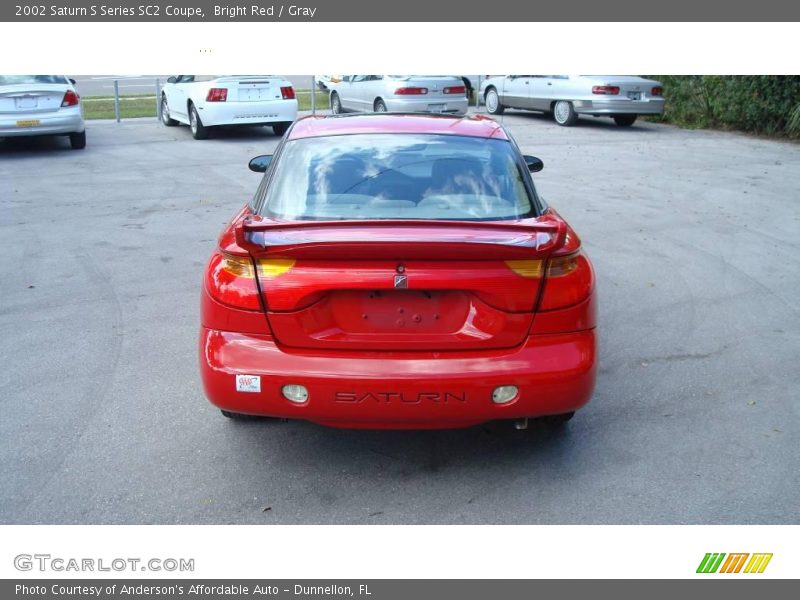 Bright Red / Gray 2002 Saturn S Series SC2 Coupe