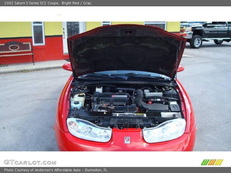 Bright Red / Gray 2002 Saturn S Series SC2 Coupe