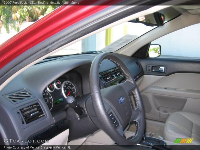 Redfire Metallic / Light Stone 2007 Ford Fusion SEL
