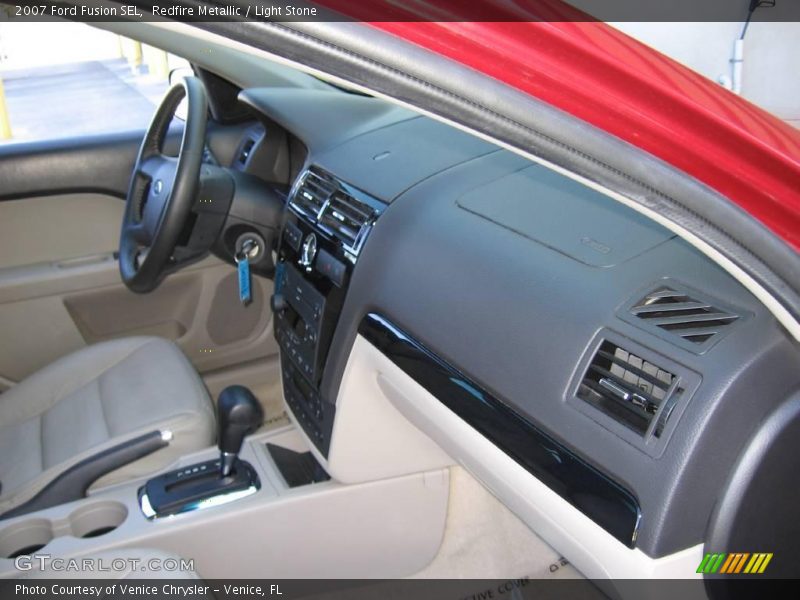 Redfire Metallic / Light Stone 2007 Ford Fusion SEL