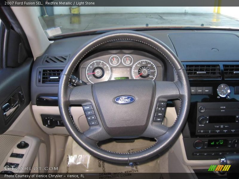 Redfire Metallic / Light Stone 2007 Ford Fusion SEL