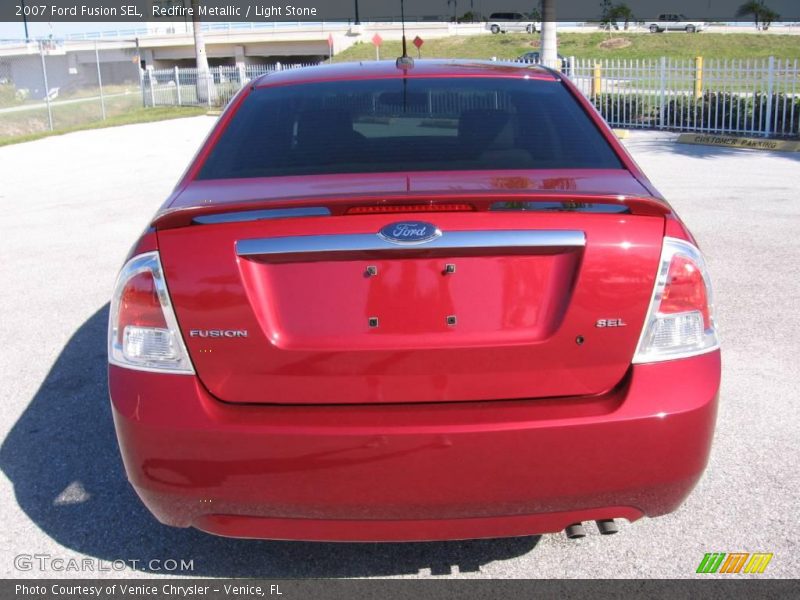 Redfire Metallic / Light Stone 2007 Ford Fusion SEL