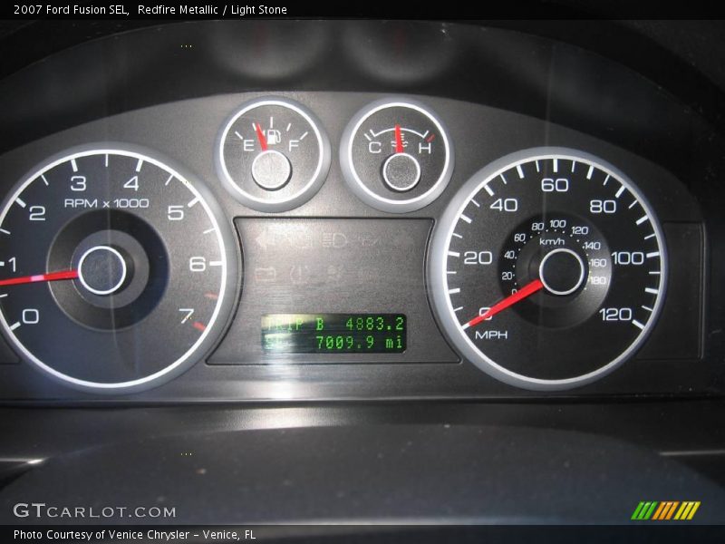 Redfire Metallic / Light Stone 2007 Ford Fusion SEL