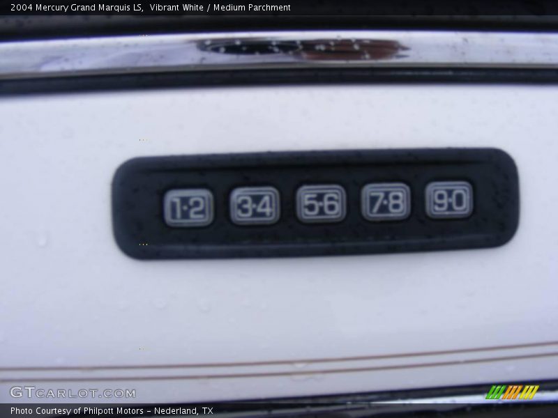 Vibrant White / Medium Parchment 2004 Mercury Grand Marquis LS