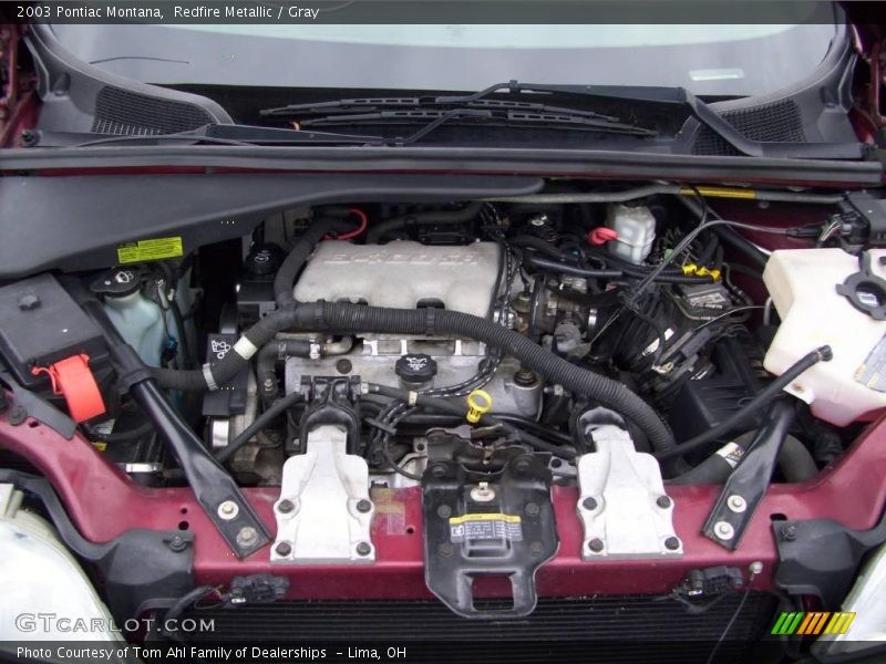 Redfire Metallic / Gray 2003 Pontiac Montana