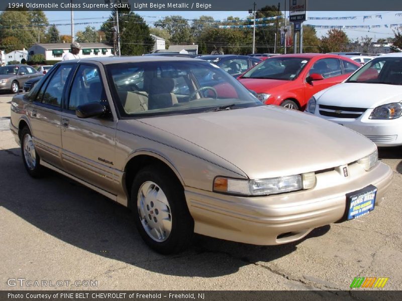 Light Beige Metallic / Beige 1994 Oldsmobile Cutlass Supreme Sedan