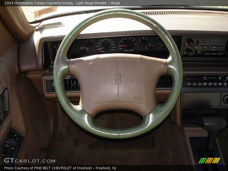 Light Beige Metallic / Beige 1994 Oldsmobile Cutlass Supreme Sedan