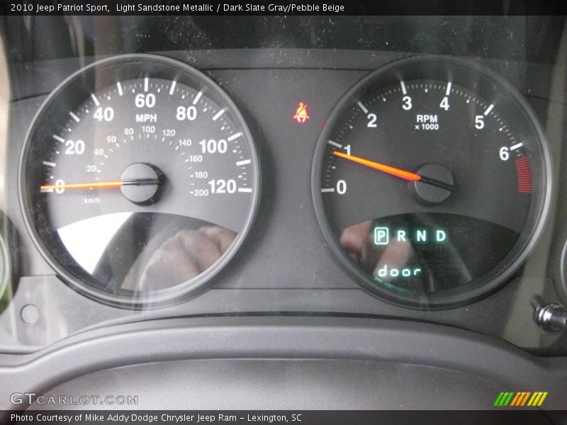 Light Sandstone Metallic / Dark Slate Gray/Pebble Beige 2010 Jeep Patriot Sport