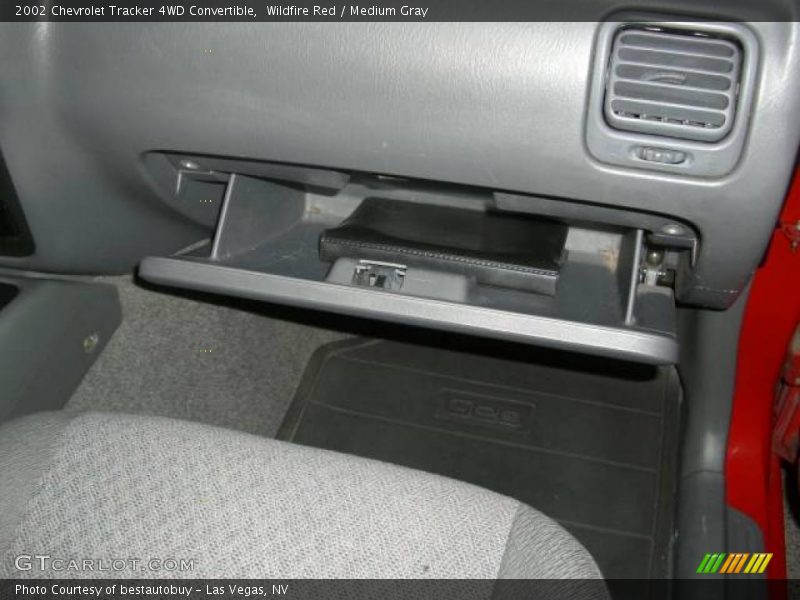 Wildfire Red / Medium Gray 2002 Chevrolet Tracker 4WD Convertible