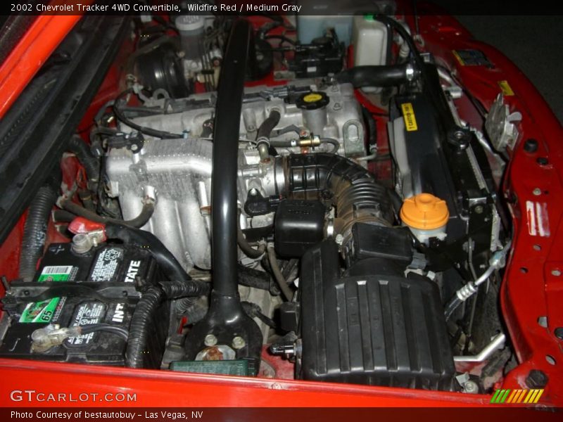 Wildfire Red / Medium Gray 2002 Chevrolet Tracker 4WD Convertible