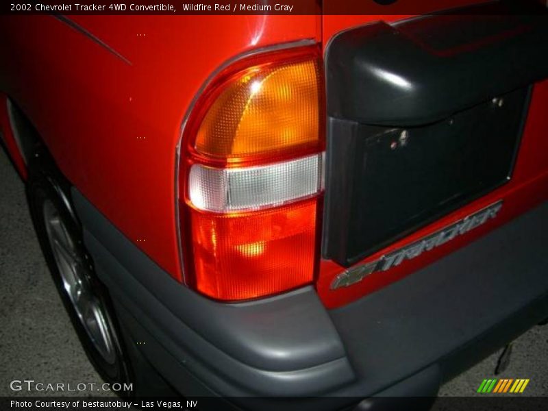 Wildfire Red / Medium Gray 2002 Chevrolet Tracker 4WD Convertible