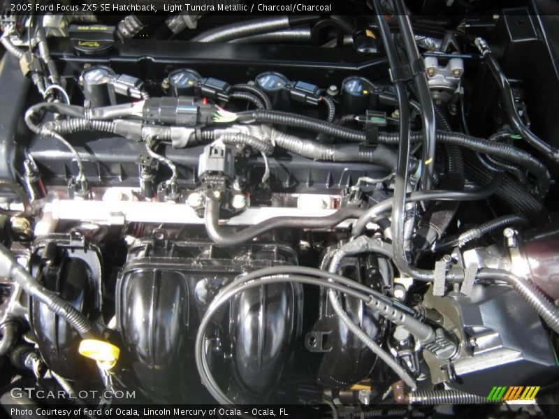 Light Tundra Metallic / Charcoal/Charcoal 2005 Ford Focus ZX5 SE Hatchback