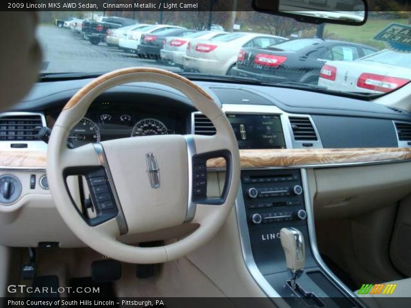Cinnamon Metallic / Light Camel 2009 Lincoln MKS AWD Sedan