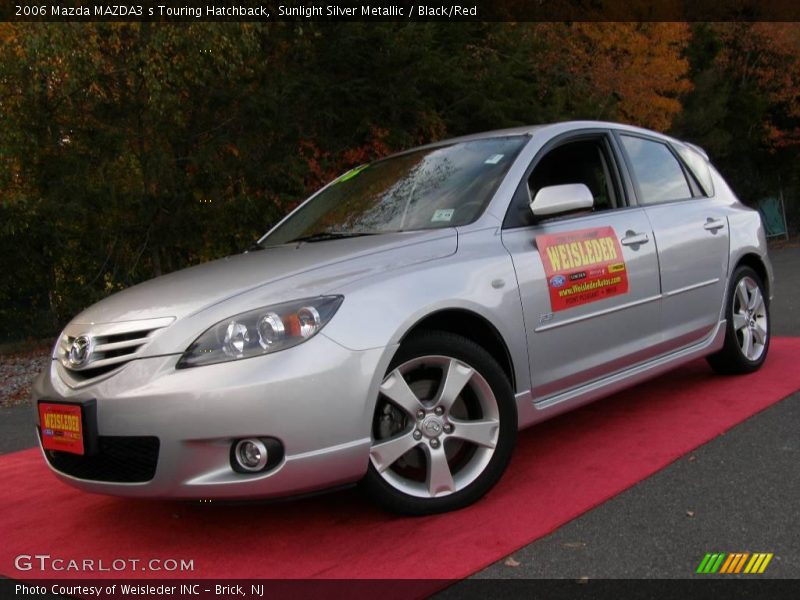 Sunlight Silver Metallic / Black/Red 2006 Mazda MAZDA3 s Touring Hatchback