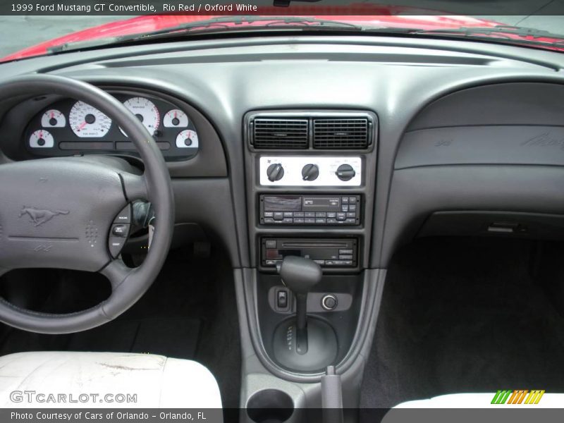 Rio Red / Oxford White 1999 Ford Mustang GT Convertible