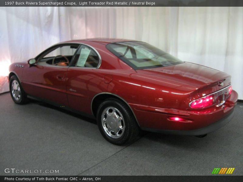 Light Toreador Red Metallic / Neutral Beige 1997 Buick Riviera Supercharged Coupe